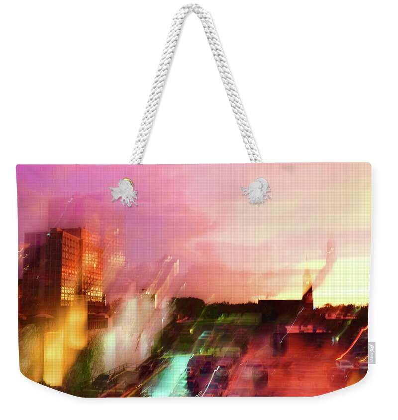 Sunset Weekender Tote Bag featuring the photograph Sunset Motion Impression In Red And Pink by Patrick Malon