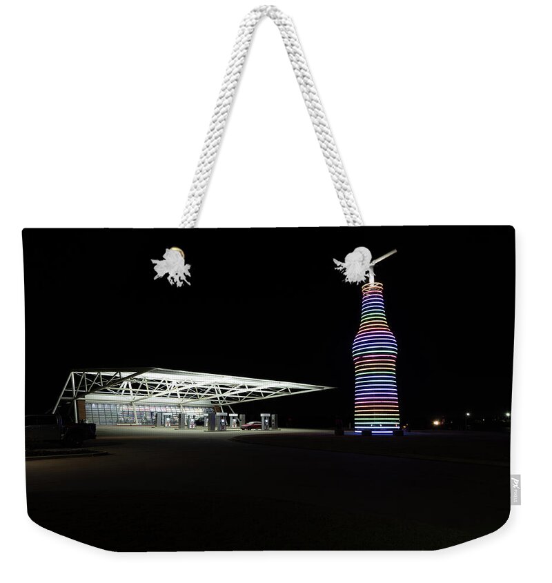  Weekender Tote Bag featuring the photograph Pops 66 Soda Ranch in Arcadia Oklahoma at night by Eldon McGraw
