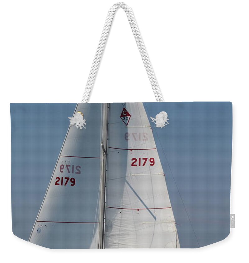  Weekender Tote Bag featuring the photograph The race #24 by Jean Wolfrum