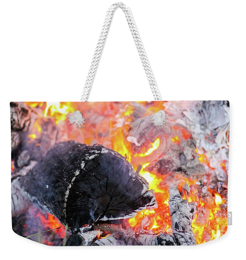 Bonfire Weekender Tote Bag featuring the photograph Bonfire at a camp in summer evening outdoors #3 by Olga Strogonova