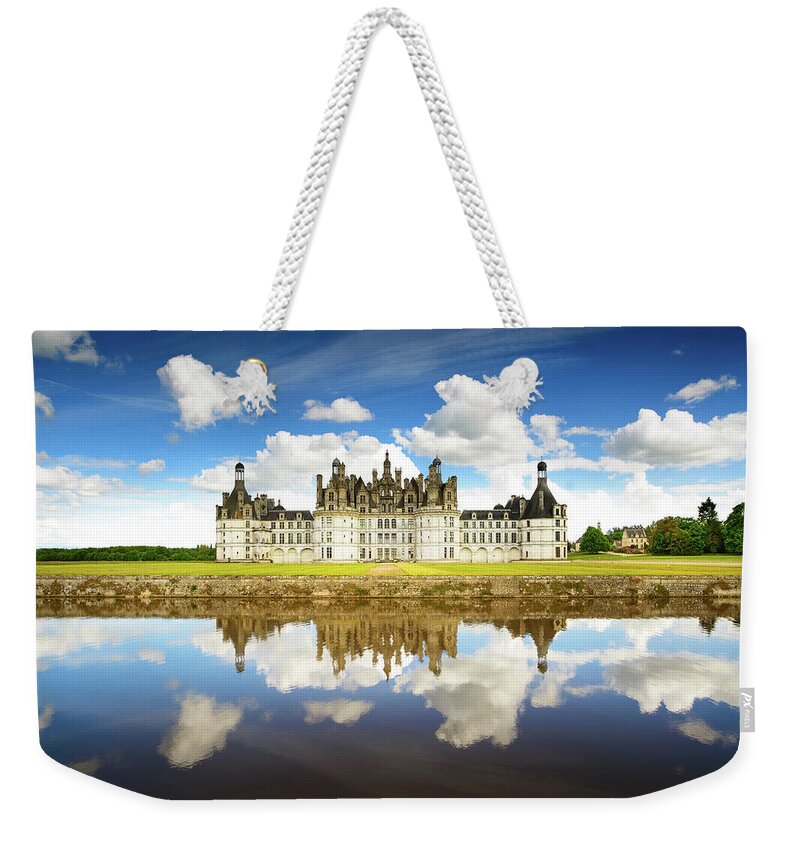 Chambord Weekender Tote Bag featuring the photograph Chateau de Chambord, Unesco medieval french castle and reflectio #3 by Stefano Orazzini
