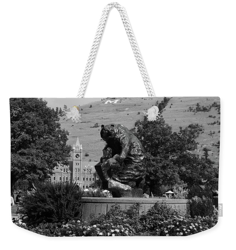 Grizzlies Weekender Tote Bag featuring the photograph The Grizzly statue at the University of Montana - Grand Griz in black and white #3 by Eldon McGraw