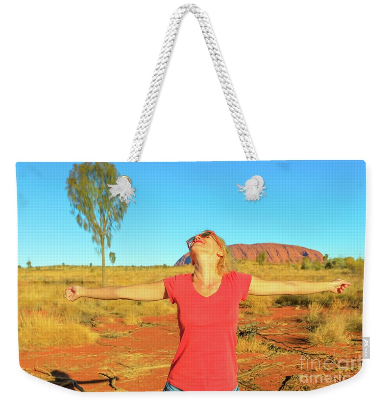 Australia Weekender Tote Bag featuring the photograph Tourist woman at Uluru #3 by Benny Marty