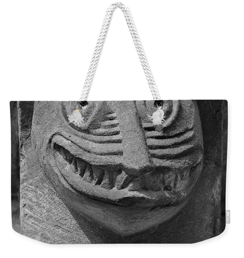 Romanesque Weekender Tote Bag featuring the sculpture The Stone Bestiary - Photo of Norman Romanesque relief sculptures from Kilpec by Paul E Williams