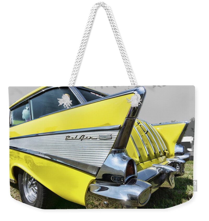 Chevy Weekender Tote Bag featuring the photograph '57 Chevy Bel Air Nomad #57 by Daniel Adams