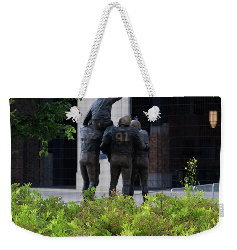 Notre Dame Fighting Irish Weekender Tote Bag featuring the photograph Back view of Coach Ara Parseghian at University of Notre Dame by Eldon McGraw