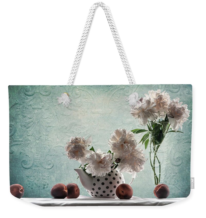 Stilllife Weekender Tote Bag featuring the photograph A Bit of Paris by Maggie Terlecki