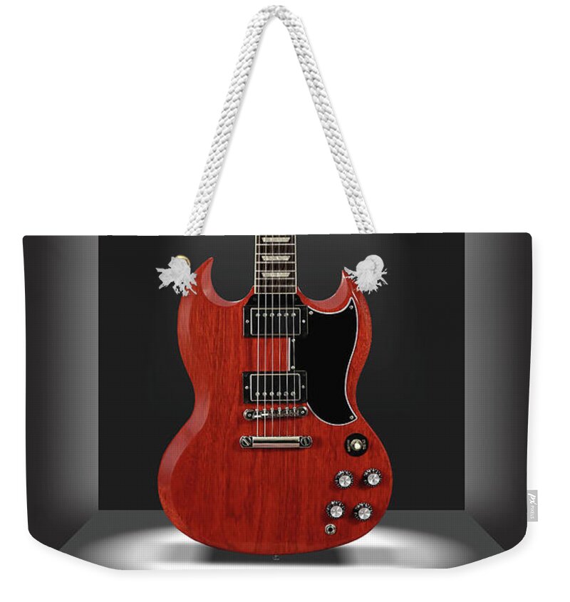 Electric Guitar Weekender Tote Bag featuring the photograph A Classic Guitar in a Box 14 by Mike McGlothlen