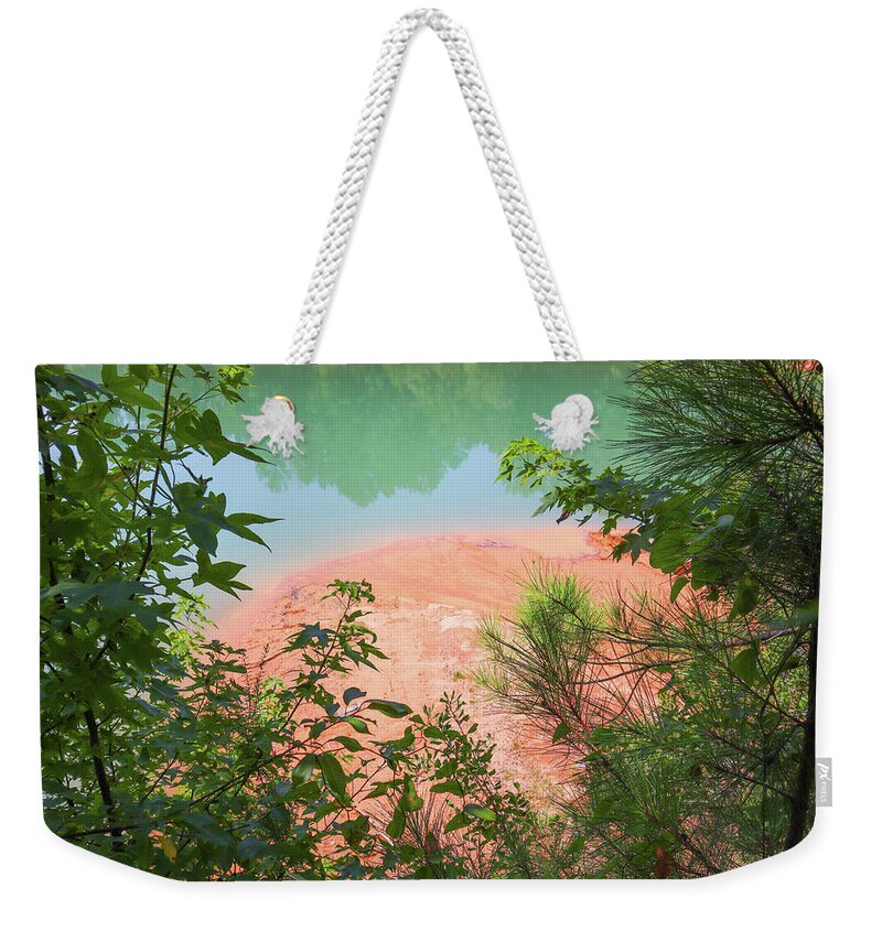 Twiggs County Weekender Tote Bag featuring the photograph A Clay Hole Red Clay Interplay by Ed Williams