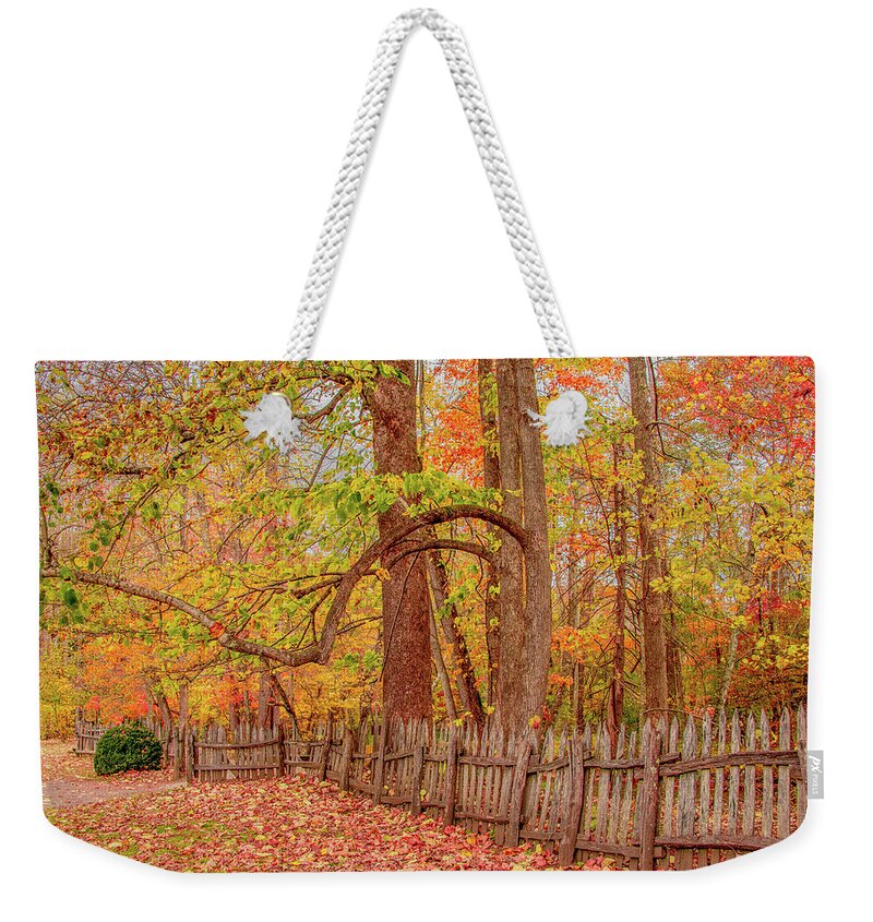 Oconaluftee Weekender Tote Bag featuring the photograph A Crooked Old Fence in the Shadow of Fall by Marcy Wielfaert
