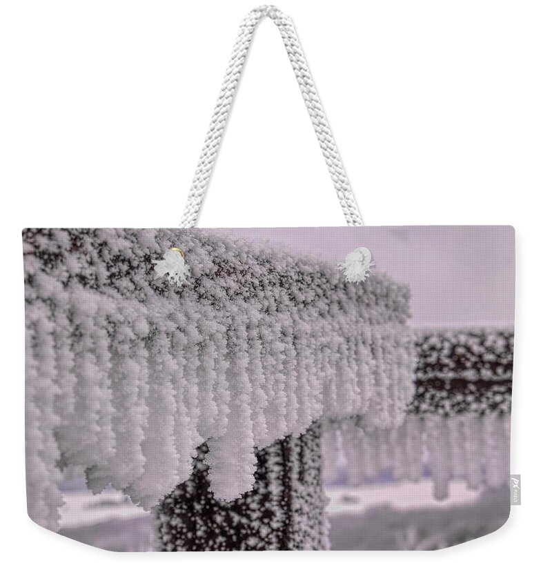 Winter Weekender Tote Bag featuring the photograph A Frozen Handrail by Dale Kauzlaric
