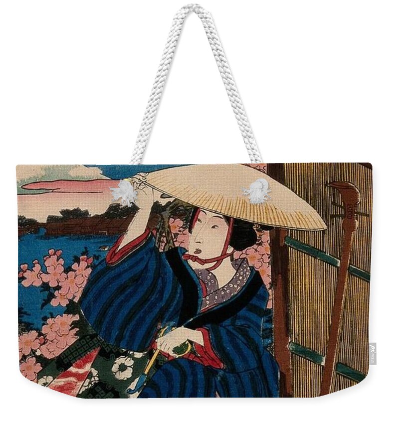A Kneeling Woman In A Broad Straw Hat Weekender Tote Bag featuring the painting A kneeling woman in a broad by Artistic Rifki