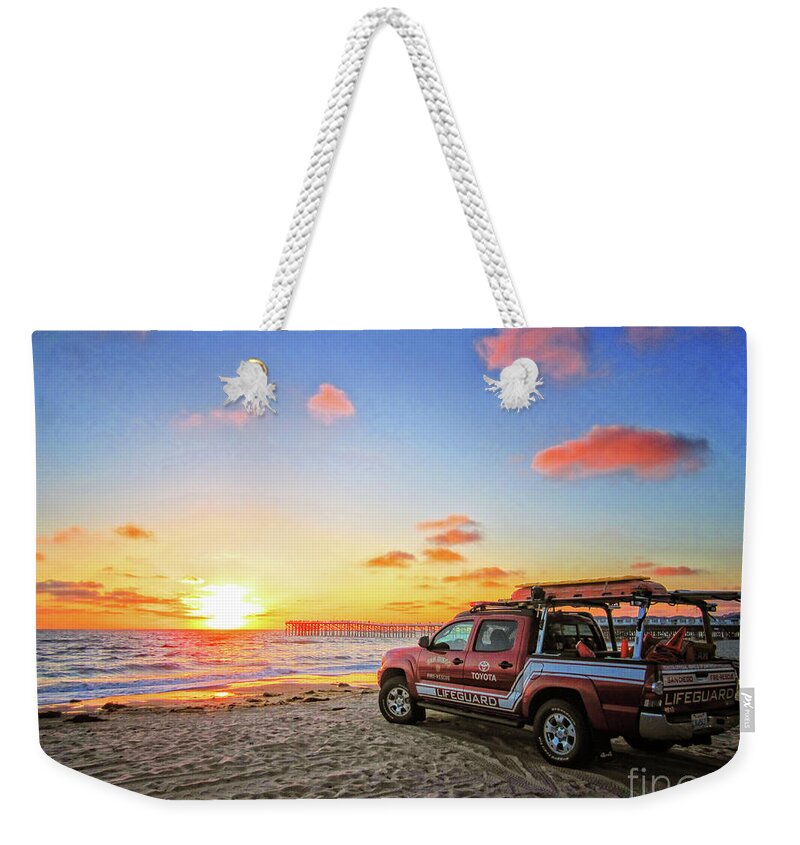 Lifeguard Weekender Tote Bag featuring the photograph A Lifeguard's Sunset by Becqi Sherman