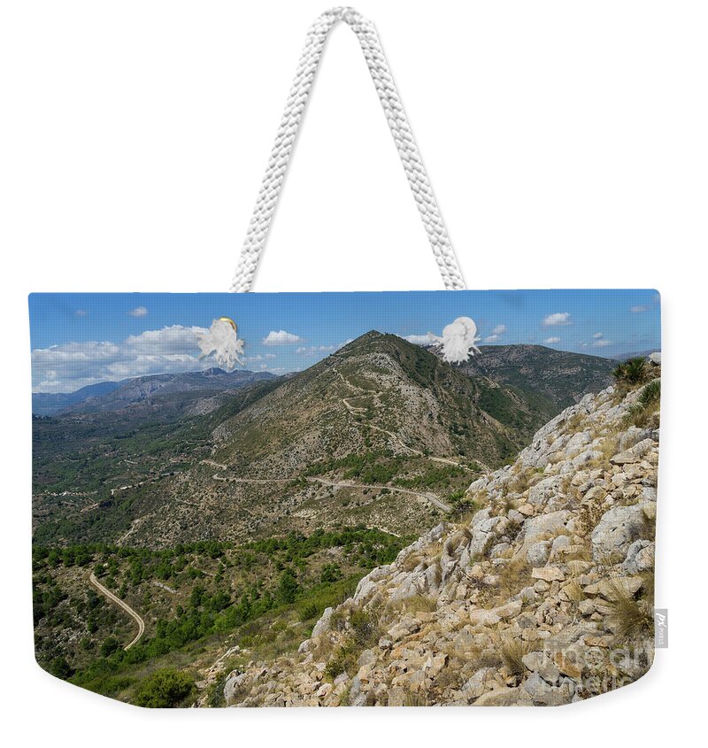 Mountains Weekender Tote Bag featuring the photograph A long way leads up the mountain by Adriana Mueller