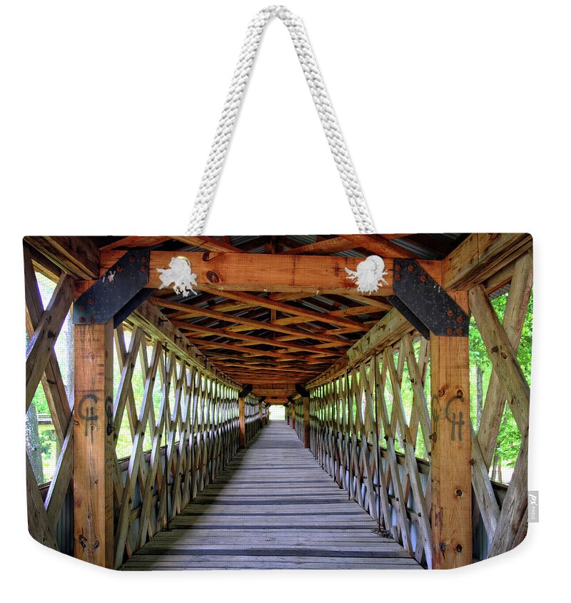 Bridge Weekender Tote Bag featuring the photograph A Look Down the Bridge by George Taylor