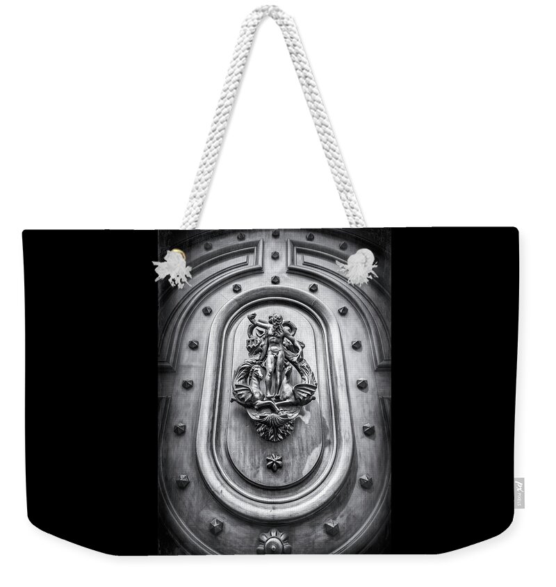 Door Weekender Tote Bag featuring the photograph A Most Unusual Door Knocker Geneva Old Town Black and White by Carol Japp