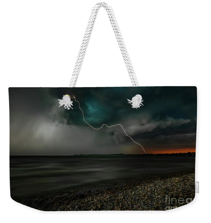 Bavaria Weekender Tote Bag featuring the photograph A stormy day at the lake by Hannes Cmarits