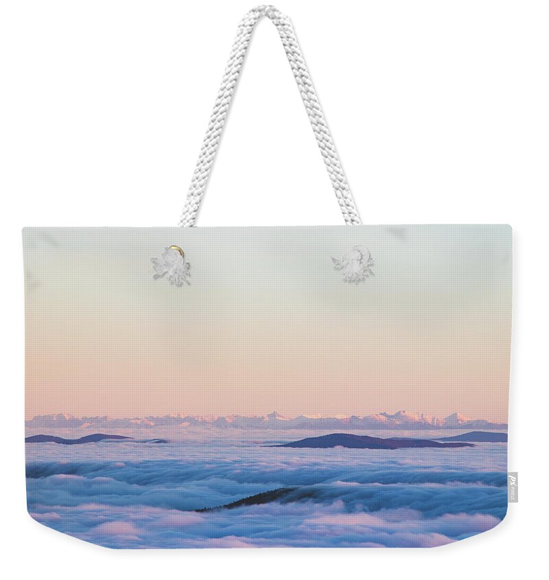 Transportation Weekender Tote Bag featuring the photograph Above clouds and sunset - High Tatras, Slovakia by Vaclav Sonnek