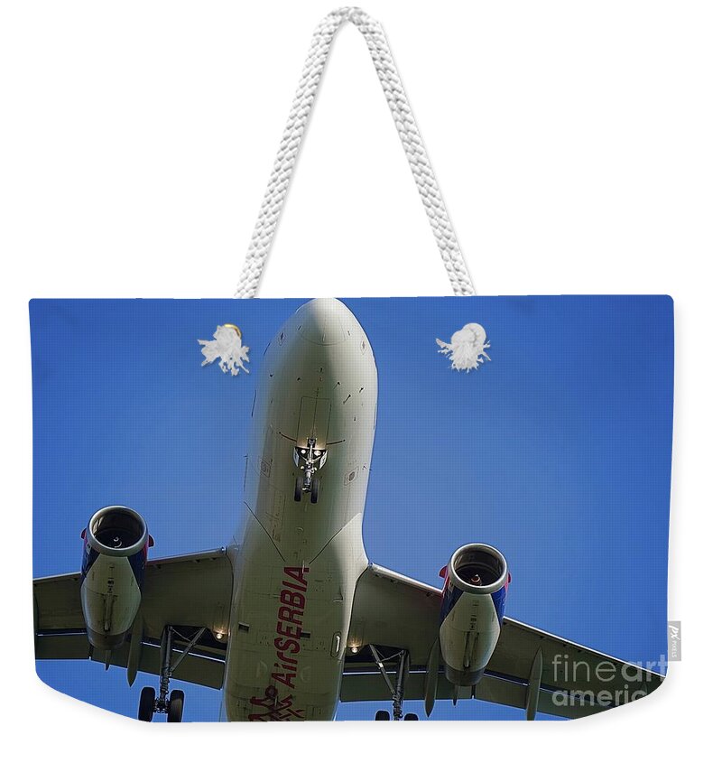 Airplane Weekender Tote Bag featuring the photograph Air Serbia by Claudia Zahnd-Prezioso