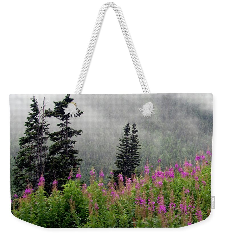 Skagway Weekender Tote Bag featuring the photograph Alaska Pines and Wildflowers by Karen Zuk Rosenblatt
