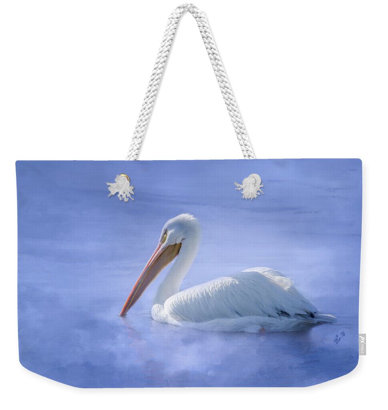 American White Pelican Weekender Tote Bag featuring the photograph American White Pelican Daydreaming by Debra Martz