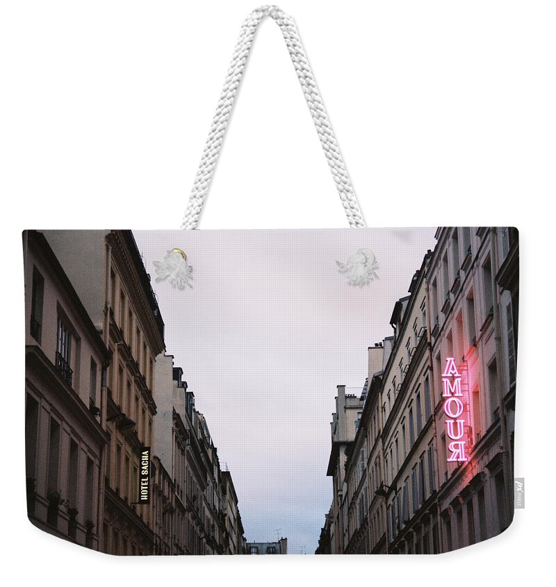 Love Weekender Tote Bag featuring the photograph Amour hotel by Barthelemy De Mazenod