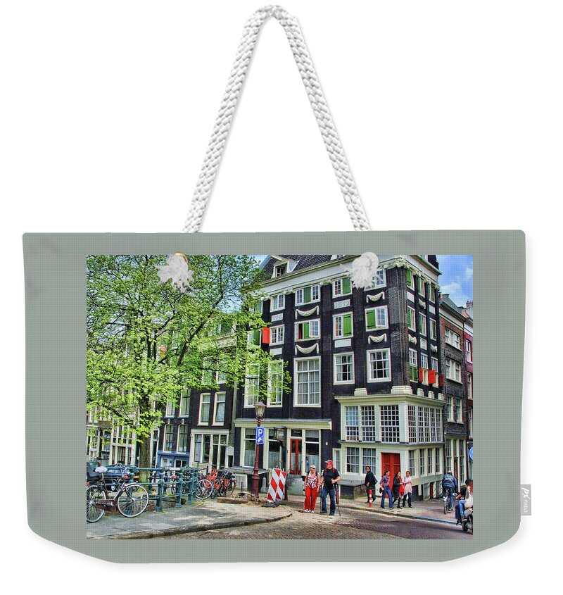 Amsterdam Weekender Tote Bag featuring the photograph Amsterdam Stroll by Allen Beatty