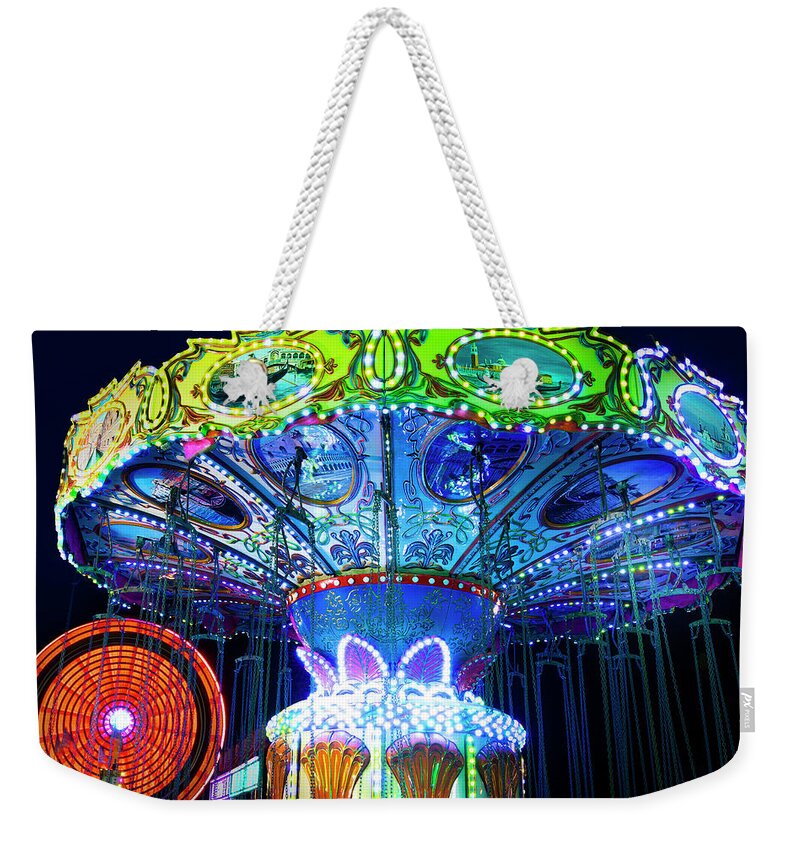 Swing Ride Weekender Tote Bag featuring the photograph An Evening at the County Fair by Mark Andrew Thomas