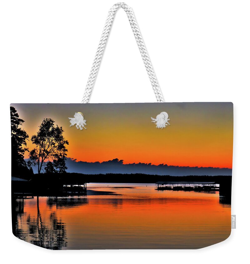 Lake Weekender Tote Bag featuring the photograph An Orange Glassy Sunrise by Ed Williams