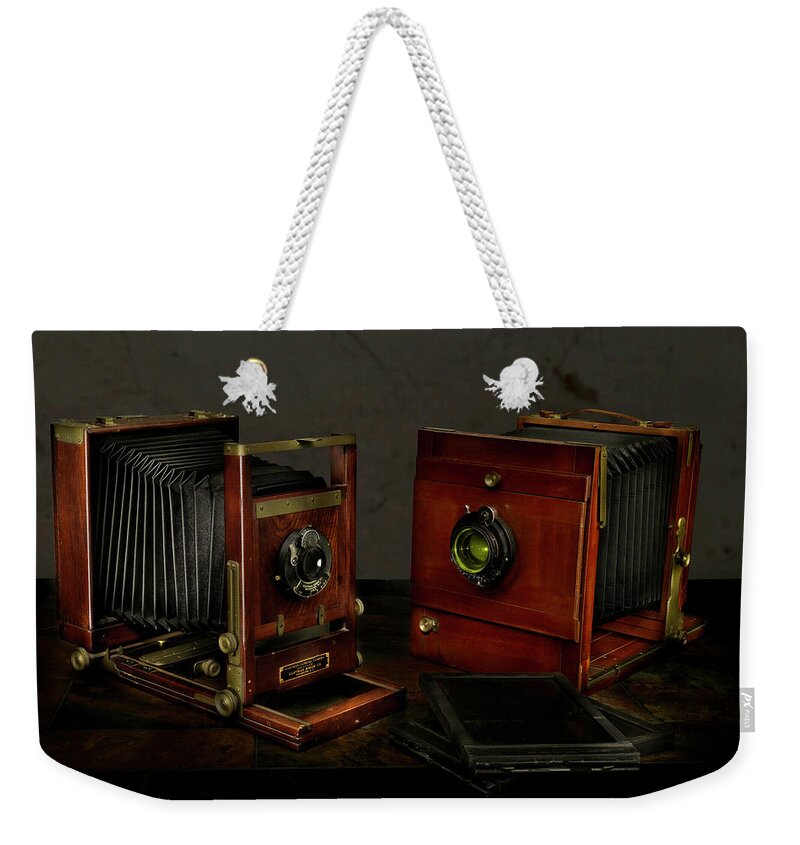 Camera Weekender Tote Bag featuring the photograph Antique View Cameras Lightpainting by Steve Templeton