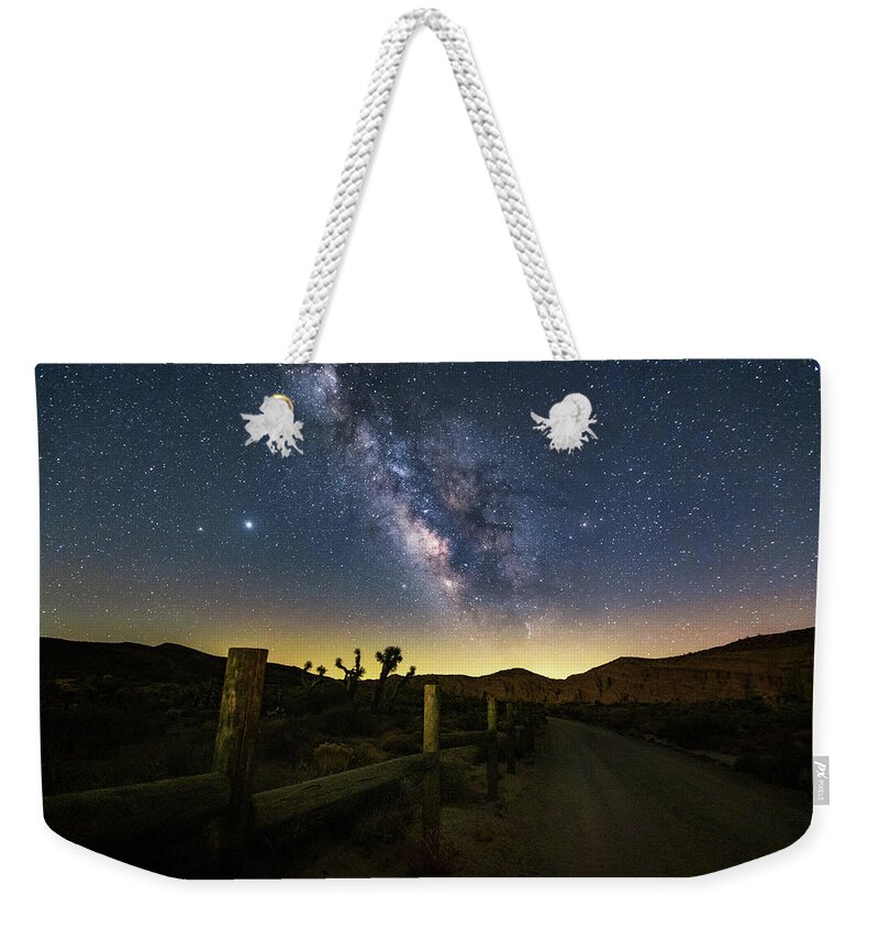Milkyway Weekender Tote Bag featuring the photograph Any road will take you there by Tassanee Angiolillo