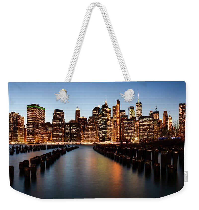 New York Weekender Tote Bag featuring the photograph Apple Empire - Lower Manhattan Skyline. New York City by Earth And Spirit