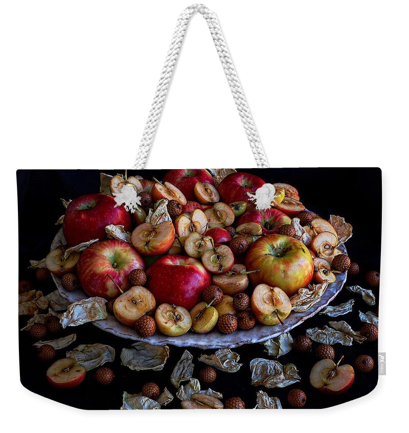 Apples And Rose Petals Weekender Tote Bag featuring the photograph Apples and Rose Petals by Sarah Phillips