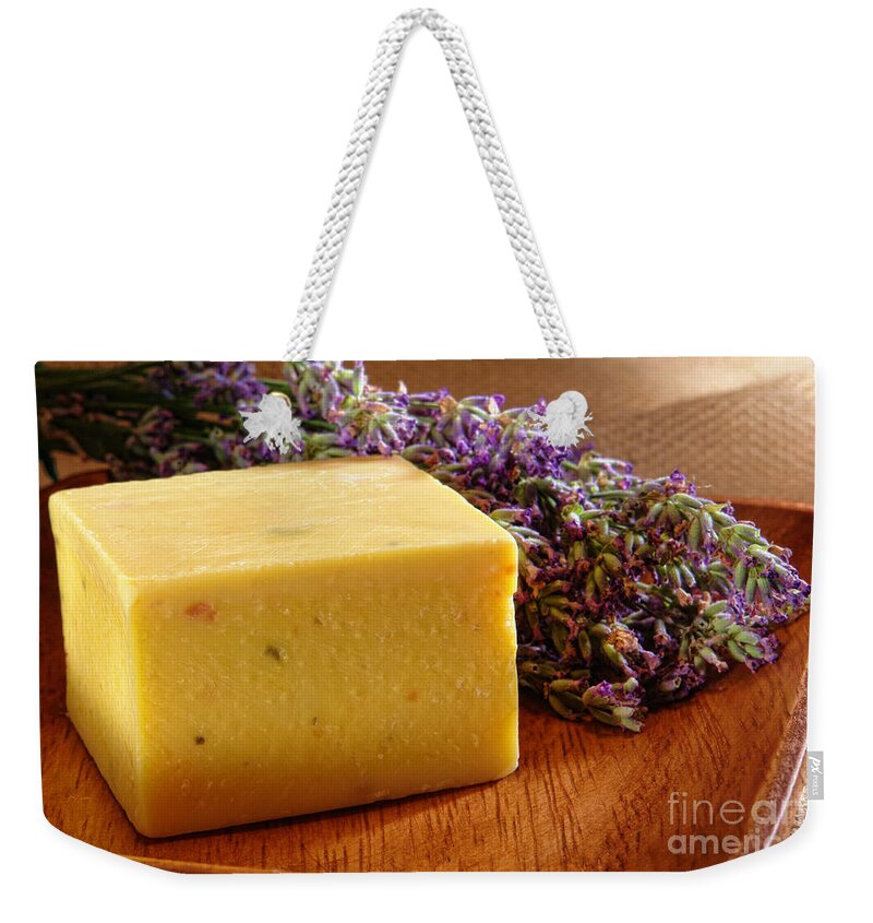 Aromatherapy Weekender Tote Bag featuring the photograph Aromatherapy Natural Soap and Lavender by Olivier Le Queinec