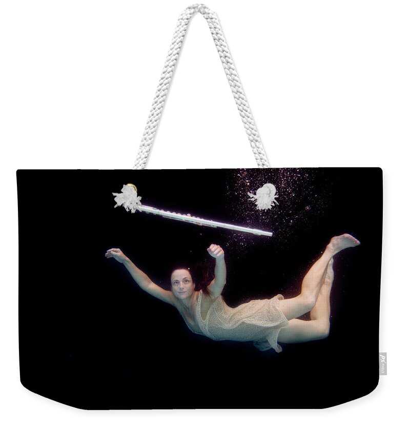 Artist Weekender Tote Bag featuring the photograph Artist magically floating with her flute 61 by Dan Friend