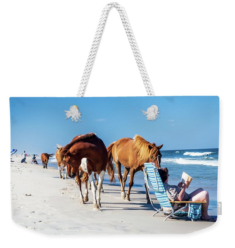 Assateague Weekender Tote Bag featuring the photograph Assateague Island - ponies on beach by Louis Dallara