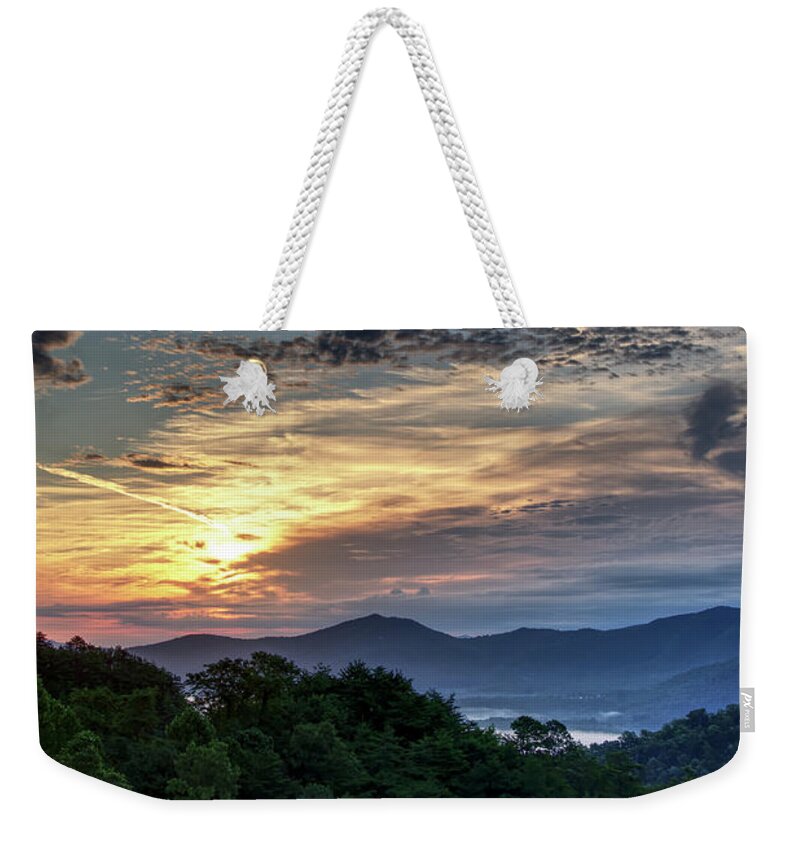 Sunrise Weekender Tote Bag featuring the photograph Atmospheric Reflections by Phil Perkins