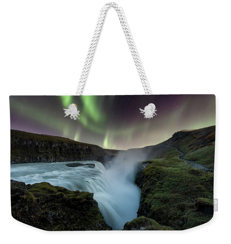 Gullfoss Weekender Tote Bag featuring the photograph Aurora Borealis over Gullfoss Waterfall in Iceland by Alexios Ntounas