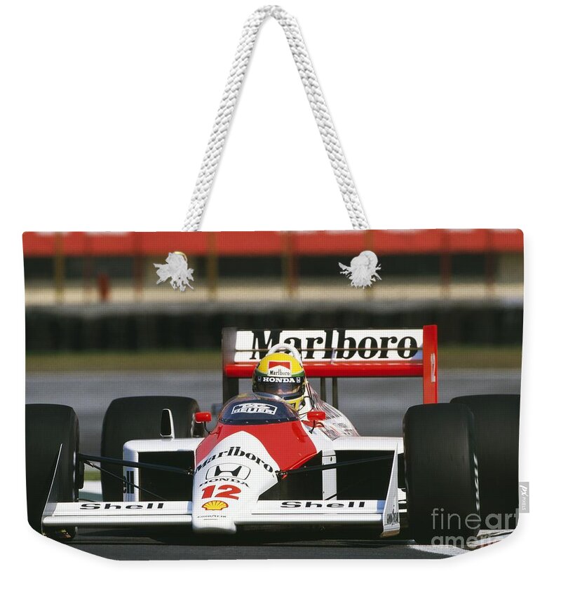 Ayrton Senna Weekender Tote Bag featuring the photograph Ayrton Senna. 1988 Mexican Grand Prix by Oleg Konin