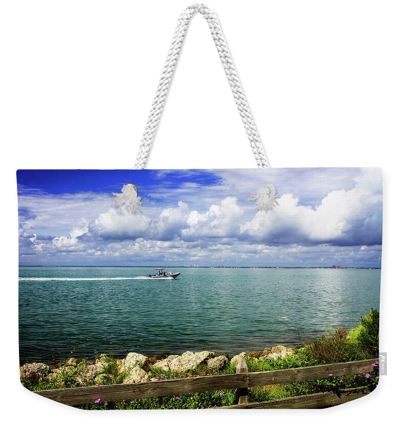 Color Weekender Tote Bag featuring the photograph Back to the Dock by Alan Hausenflock