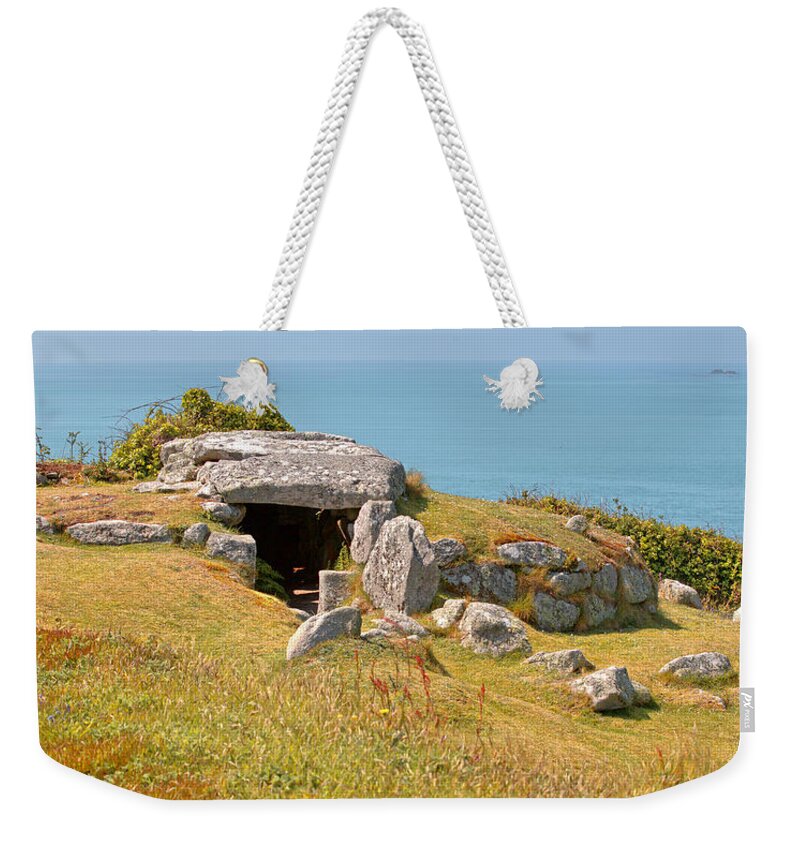 Tomb Weekender Tote Bag featuring the photograph Bant's Carn, Bronze Age tomb, Isles of Scilly. by Tony Mills