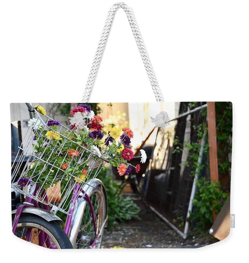 Bicycle Weekender Tote Bag featuring the photograph Basket Full of Posies by Kurt Keller