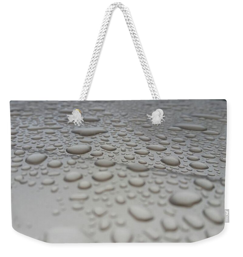  Weekender Tote Bag featuring the photograph Beading by Heather E Harman