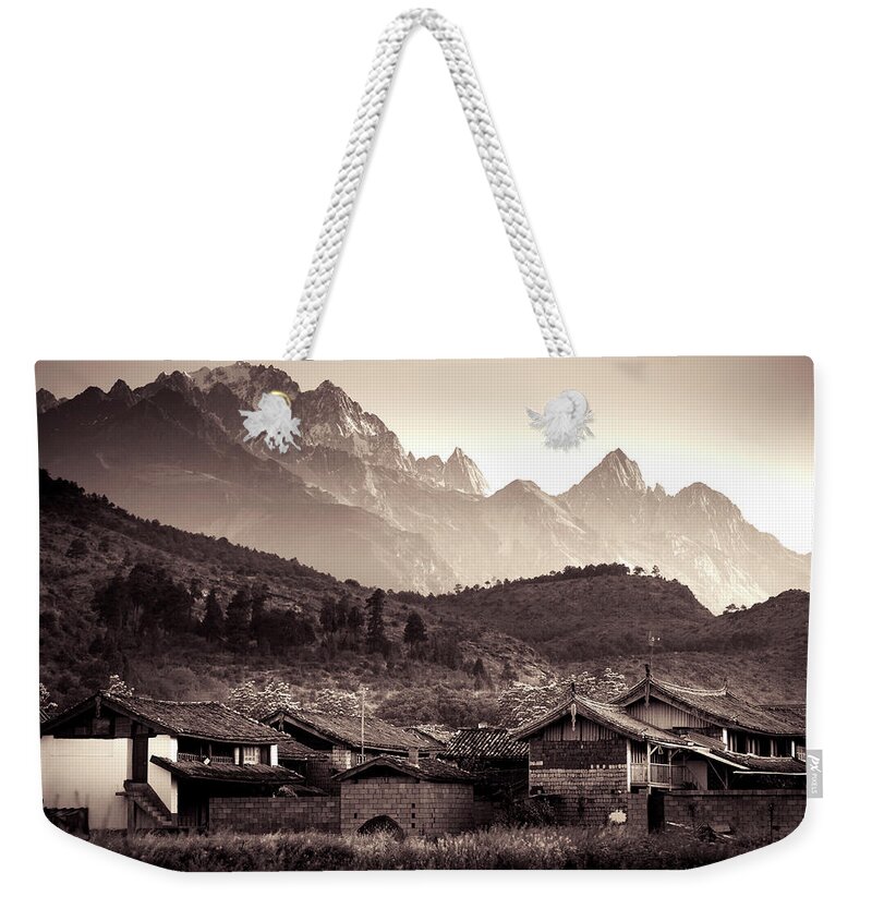 China Weekender Tote Bag featuring the photograph Below Jade Dragon Snow Mountain by Mark Gomez