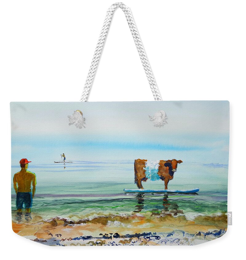 Belted Galloway Weekender Tote Bag featuring the painting Belted galloway cow on paddleboard at seaside surreal painting by Mike Jory