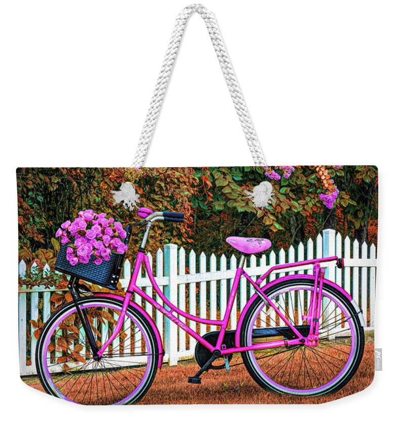 Carolina Weekender Tote Bag featuring the photograph Bicycle by the Garden Fence Early Autumn by Debra and Dave Vanderlaan