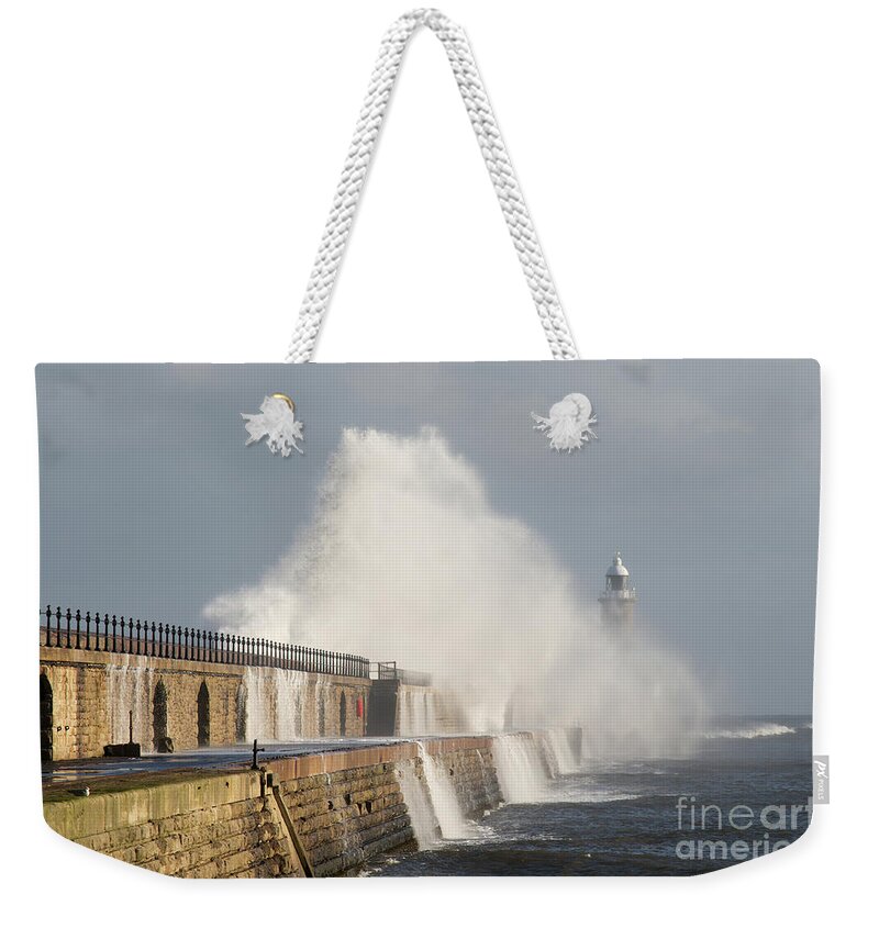 Storm Weekender Tote Bag featuring the photograph Big wave Tynemouth pier by Bryan Attewell