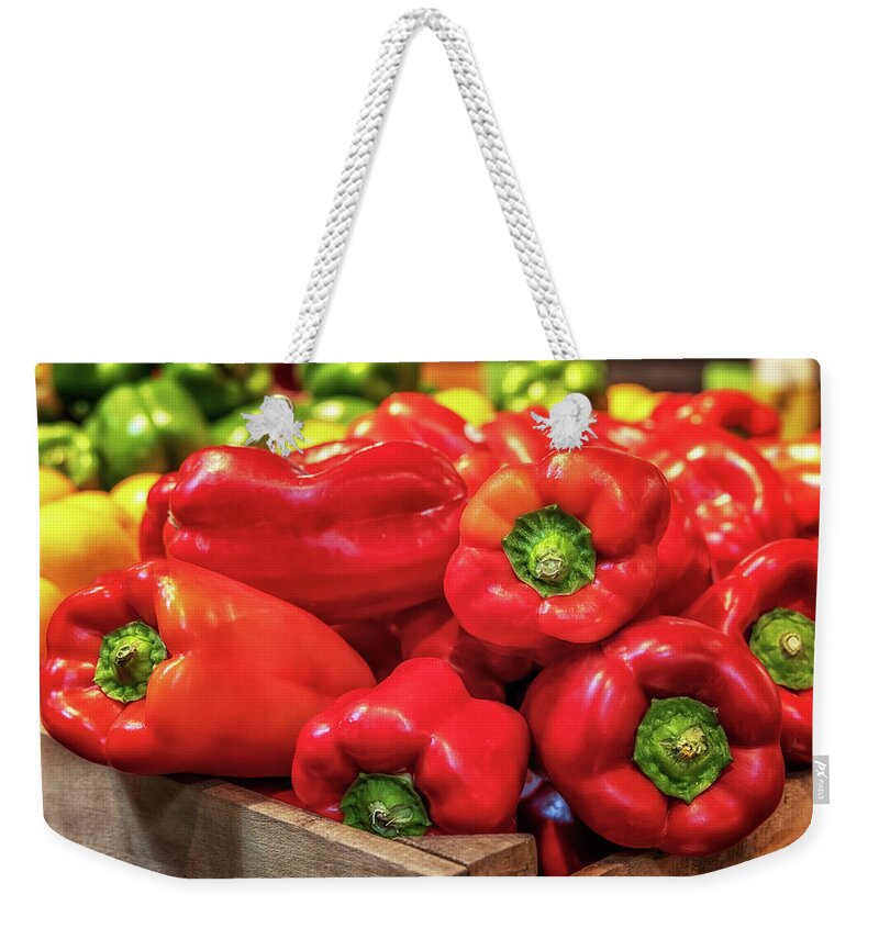 Produce Weekender Tote Bag featuring the photograph Bin of Bell Peppers by Susan Rissi Tregoning