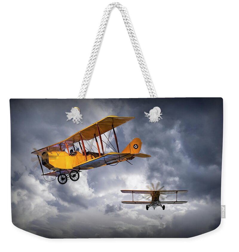 Airplane Weekender Tote Bag featuring the photograph Biplanes among the Clouds by Randall Nyhof