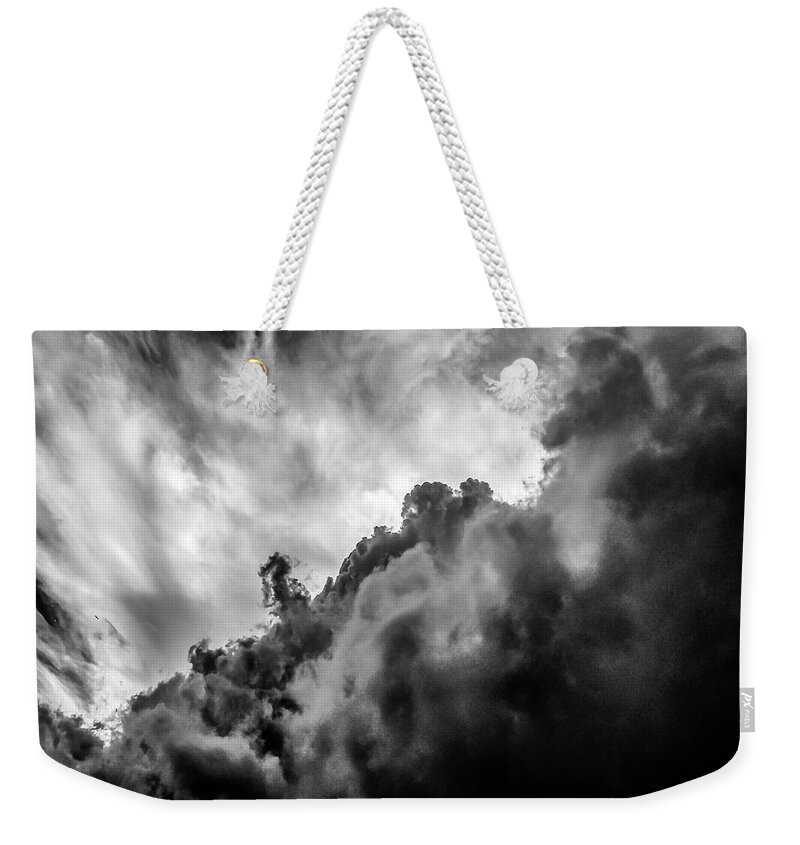Nature Weekender Tote Bag featuring the photograph Black and white Clouds by Louis Dallara